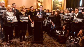 Daniel Barlow of Vermont Businesses of Social Responsibility, standing with representatives of a broad cross section of 25 organizations releasing a shared climate action platform for the 2019 legislative session.