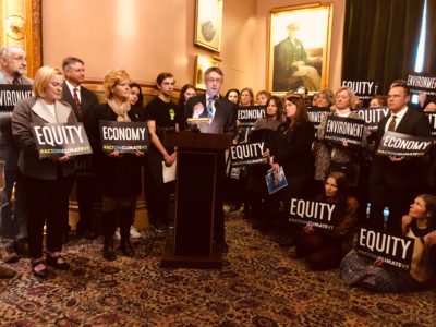 Daniel Barlow of Vermont Businesses of Social Responsibility, standing with representatives of a broad cross section of 25 organizations releasing a shared climate action platform for the 2019 legislative session.